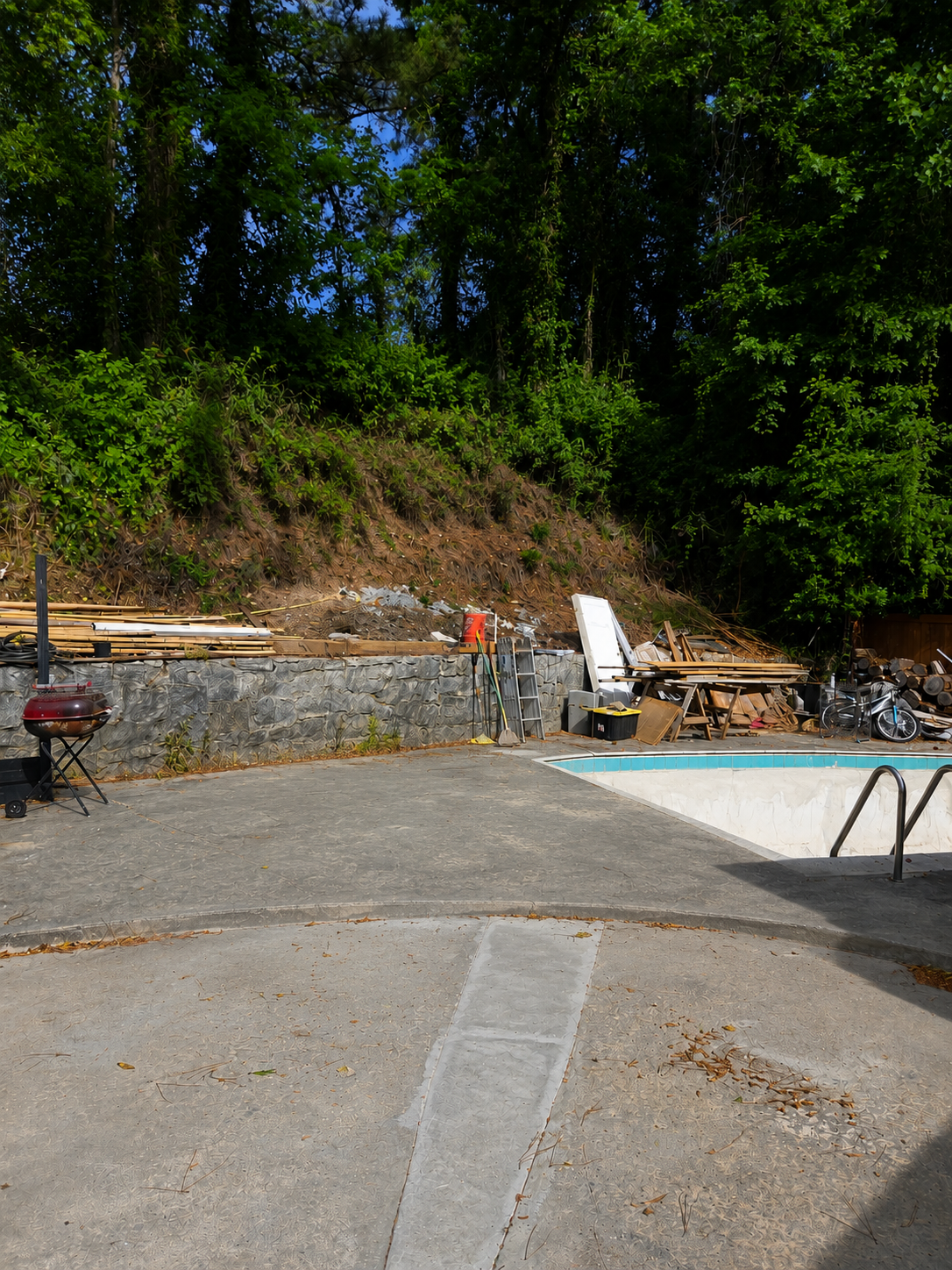 Empty patio before outdoor kitchen build