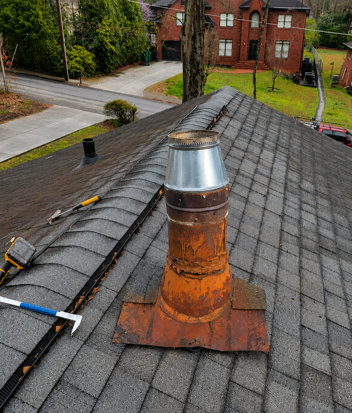 Old rusted roof vent before replacement